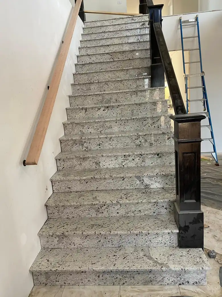 Decorative mosaic feature wall in a contemporary laundry