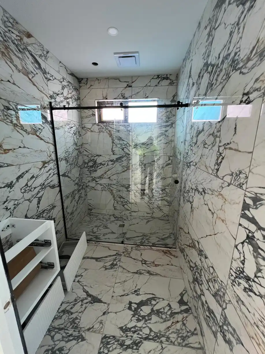 Large-format porcelain kitchen floor tiles in a contemporary home